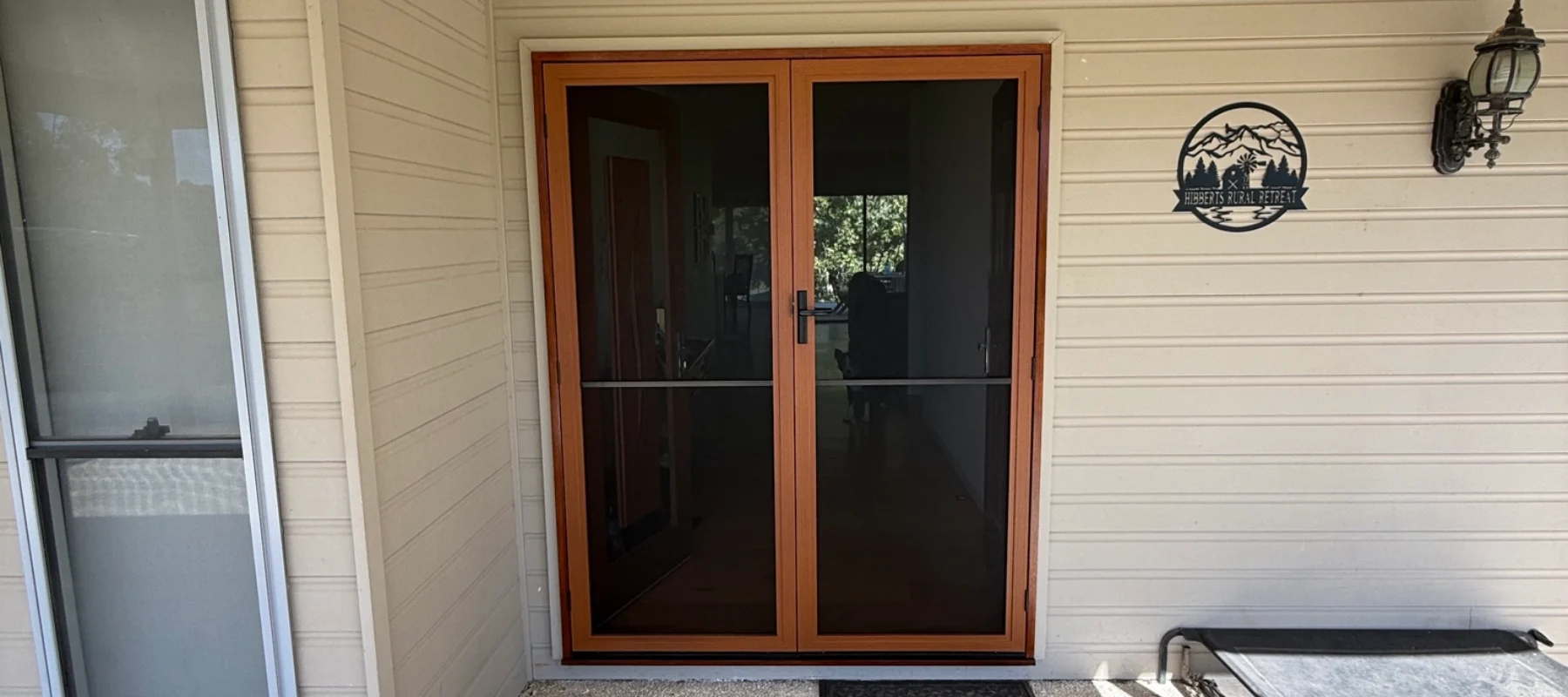 How Merbau Decowood Fly Screens Gave Paul’s Door a Seamless Finished Look in Clagiraba