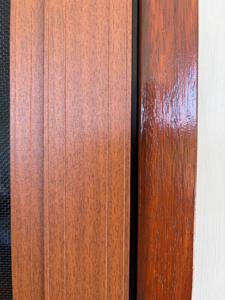 Close-up showing Merbau Decowood fly screen frame matching existing Merbau timber door frame, Clagiraba, Gold Coast